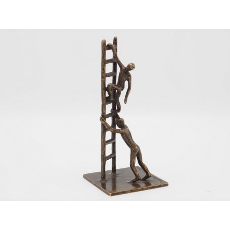 Pronssinen patsas "Tikkaissa tuetaan"