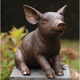 Pronssinen possupatsas "Sitting Pig" Pronssinen possupatsas "Sitting Pig"