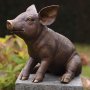 Pronssinen possupatsas "Sitting Pig"